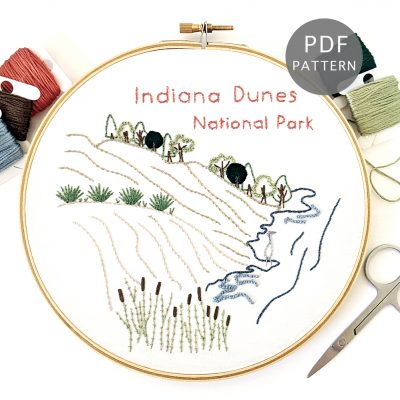 Indiana Dunes National Park hand embroidery pattern stitched on white cotton inside a wooden hoop.