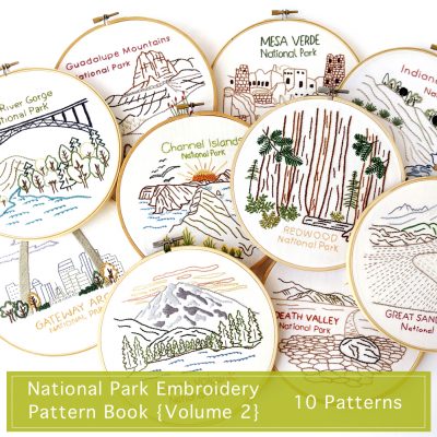 10 National Park hand embroidery patterns stitched on white cotton inside bamboo hoops.