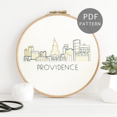 The Providence, Rhode Island city skyline stitched on white fabric.