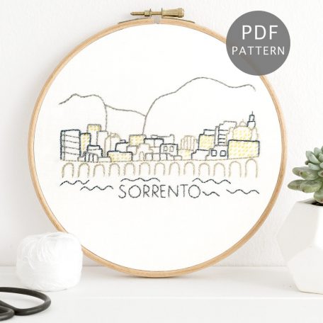 The Sorrento, Italy coastline stitched on white fabric.